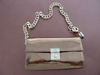 I loved the finish on this Guiseppe Zanotti bag.