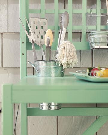 This bucket full of utensils won't be falling over because it's inserted into the table. This bucket full of utensils won't be falling over because it's inserted into the table.
