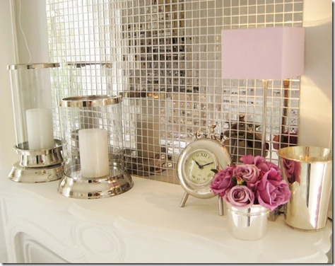 romantic-mantel-fireplace-silver-mosaic-tiles-pink-flowers-hurricanes1