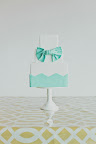 Why not have a cake that matches your dress? A sweet accessory indeed!