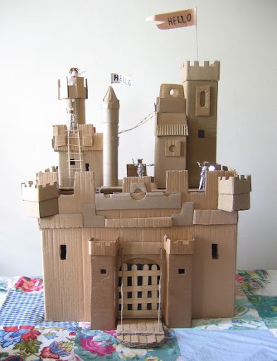 Paper towel tubes make perfect turrets for castles and toy house chimneys. This castle made by Ann Wood is SO beautiful!!! (link below)