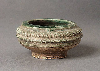 Miniature Bowl Afghanistan Miniature Bowl, 8th-9th century Ceramic; Vessel, Fritware, green glaze, carved, Diameter: 2 3/4 in. (6.99 cm) Gift of Andrew Hale and Kate Fitz Gibbon (AC1992.213.11) Art of the Middle East: Islamic Department.