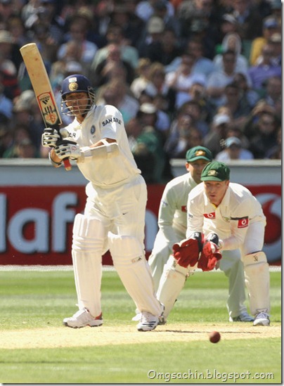 Sachin Tendulkar of India in action with Michael Clarke (L) and Brad Haddin (R) of Australia looking on during day two of the First Test match between Australia and India at Melbourn