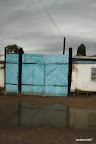 Blue gates are standard in Kochkor