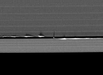 800px-Daphnis_edge_wave_shadows.jpg