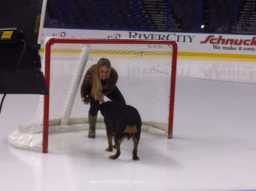 Kelly guards the goal from Rodney's shot.