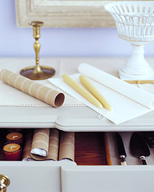 Loose candles can get damaged easily when stored in drawers. Use paper-towel tubes -- the perfect size and shape -- to protect them. Wrap a pair of candles in tissue paper, then slip the package into a cardboard tube.
