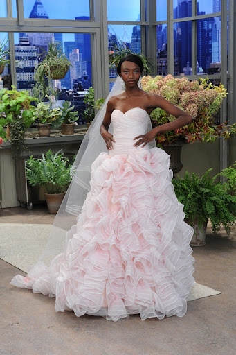 The pale pink of this sweetheart-neck organza-skirted gown is so on-trend. Reese Witherspoon wore a blush-hued creation at her recent wedding. (Photo: David M. Russell/The Martha Stewart Show)