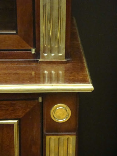 More gold detailing - the contrast with brown wood here is so rich and warm–perfect autumn shades. More gold detailing - the contrast with brown wood here is so rich and warm–perfect autumn shades.