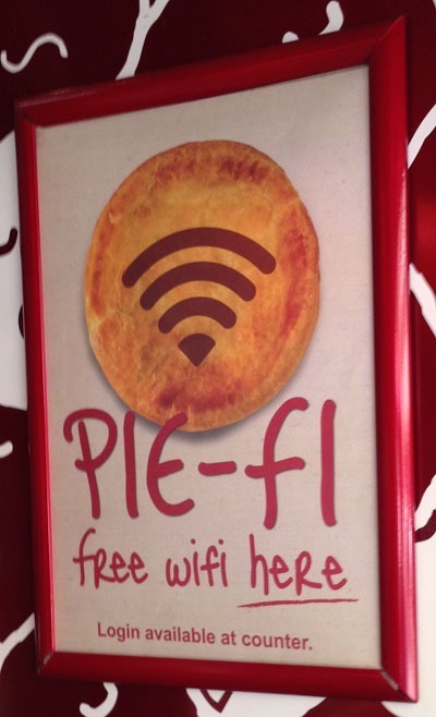 Pie shop advising the Wi-Fi password is available at the counter