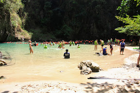 Tourists swarming in to the Emerald Cave Lagoon