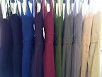 A rainbow of bridesmaid dresses. A rainbow of bridesmaid dresses.