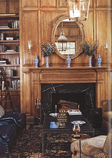 To emulate an older look, Kleinberg finished new pine paneling in the library with a stain that gave it a worn appearance. To emulate an older look, Kleinberg finished new pine paneling in the library with a stain that gave it a worn appearance.