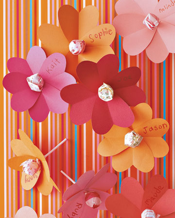 With just a little TLC, colorful hearts flourish as the petals of a new flower variety -- one with a lollipop center and stem. Get the how-to here: http://www.marthastewart.com/267672/sweet-tidings-handmade-valentines-for-ki