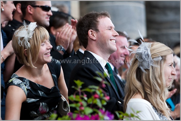 guests at dollar academy wedding watch the pipe band