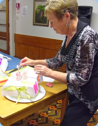 Our Catering Manager, Diane Lyons lighting the 'singing' Birthday candle to celebrate 36 years the Club has been in existence! Photo courtesy of Dennis Lyons.