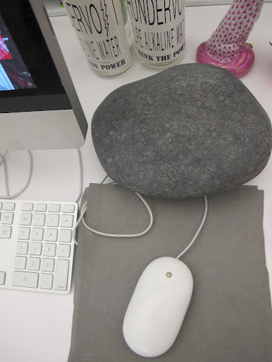 The layered paper beneath my computer mouse is complemented by the decorative rock behind it. Technology can be a great starting point for creative decor. The layered paper beneath my computer mouse is complemented by the decorative rock behind it. Technology can be a great starting point for creative decor.