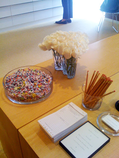 I love a neat desk!  And that bowl of candy...!