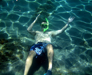 Tim tried to teach Kate how to dive down to swim with the fishes.