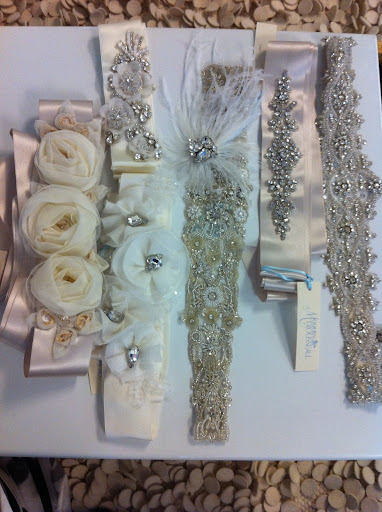 What gorgeous belts! One would dress up a simple gown in seconds; they range from $100 to $800. Go to Modern Trousseau's website to find out when they can be purchased.