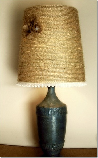 Updated lampshade wrapped in jute with burlap flowers and white pleated fabric trim