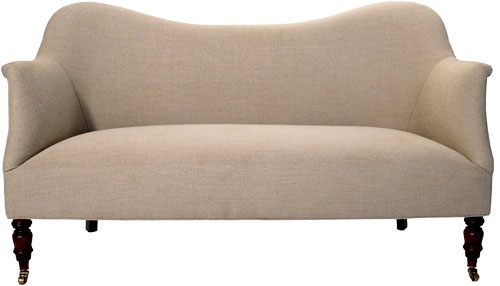The simple silhouette of this sofa lets the natural linen fabric shine. 
(johnderian.com)