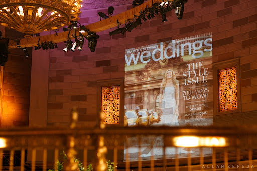 Bentley Meeker Lighting & Staging set the scene with amazing projections of past Martha Stewart Wedding magazine covers on the walls. Bentley Meeker Lighting & Staging set the scene with amazing projections of past Martha Stewart Wedding magazine covers on the walls.