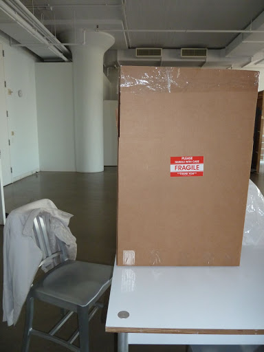 Fragile indeed, this massive box held a five-tiered masterpiece inside.
