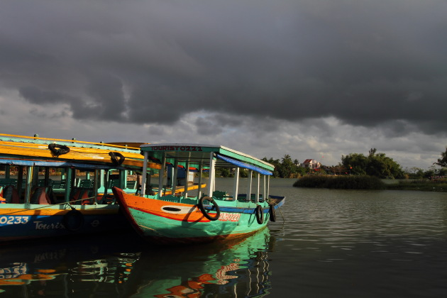 Boats at Hoi An's riverside ready to take you on a cruise