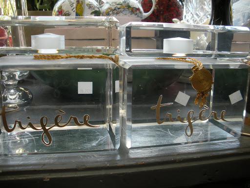 These were probably used for a perfume display, as they are very large. I think they would have a great second life as home decorating pieces though. They're so unique.