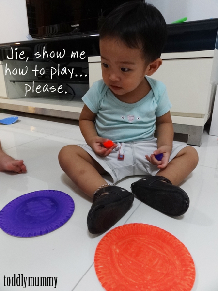 Poms on a plate blowing activity 2.jpg Poms on a plate blowing activity 2