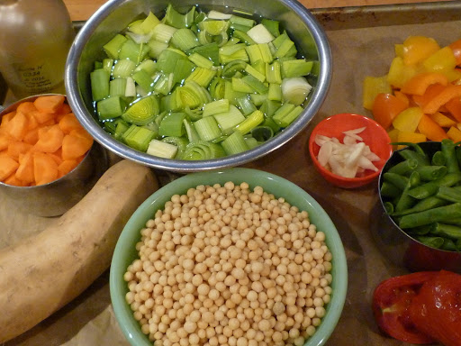 Leeks have a lot of grit so once cut, they're soaked in several changes of water until clean. In the front, we have  Israeli couscous and in the bottom left corner, a white sweet potato.