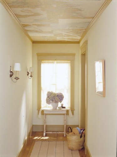 The antique maps on the ceiling pair well with the elegance of this space. (Martha Stewart Living, August 2002)
