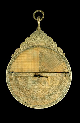 Astrolabe (forgery?) | Origin:  Iran | Period: late 19th century | Details:  Not Available | Type: Brass | Size: H: 20.1  W: 13.1   D: 3.1  cm | Museum Code: F1942.8a-h | Photograph and description taken from Freer and the Sackler (Smithsonian) Museums.
