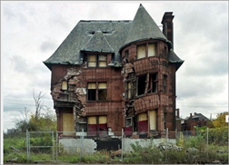 c0 an old house collapsing in on itself in Detroit; part of a fascinating collection of photos at perrystreetpalace.com 