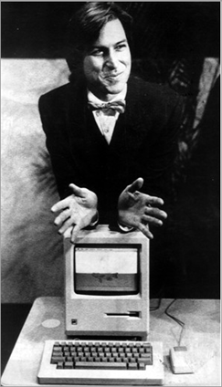 c0 Steve Jobs shows off a Macintosh in 1984