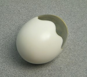 acrylic egg sculpture paperweight bottom closeup