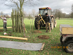 Timmy Willis in charge of the post hole borer
