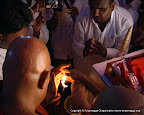 Most Ven Ariyadhamma Maha Thero Lighting up a Candle