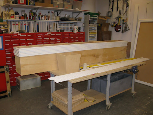 The team glued the slats onto the wooden base.