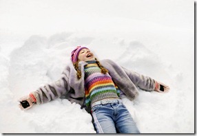 GirlMakingSnowAngels