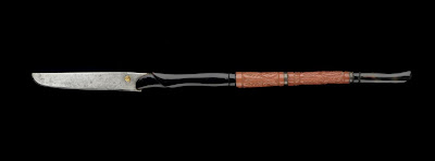 Pen knife | Origin:  Turkey | Period: 18th-19th century  Ottoman period | Details:  Not Available | Type: Tortoise shell, red coral and metal | Size: H: 19.8  W: 1.0   D: 0.6  cm | Museum Code: S1991.1 | Photograph and description taken from Freer and the Sackler (Smithsonian) Museums.