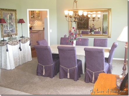 Marble Table, green walls, dining room, purple chairs, large mirror