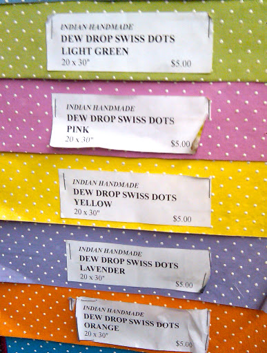 Bright and cute, these Swiss dots are classic.