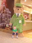 J with the Harrod's bear at the airport...yes, you could purchase this bear for only 1,600 British pounds!