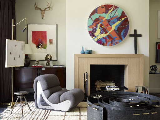The clean lines of the fireplace are so soothing. I love the color of the wood. (Robert Stilin)