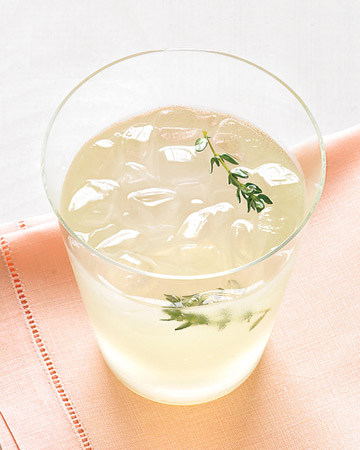 Fresh herbs, like thyme, impart an aromatic layer to a spiked lemonade.