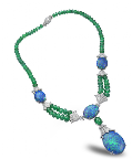 We featured this show stopping platinum, opal, emerald bead, and diamond necklace from Oscar Heyman in our 2012 Real Weddings issue. We think it would be stunning for an ocean side nuptial.