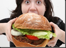 woman-eating-giant-burger