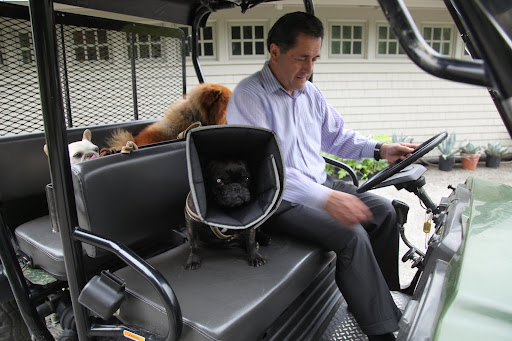 I'll sit up front with Uncle Carlos!  Onward to the chickens!